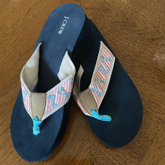 Ladies J Crew flip flops with slight wedge. There’s no size. New or EUC.